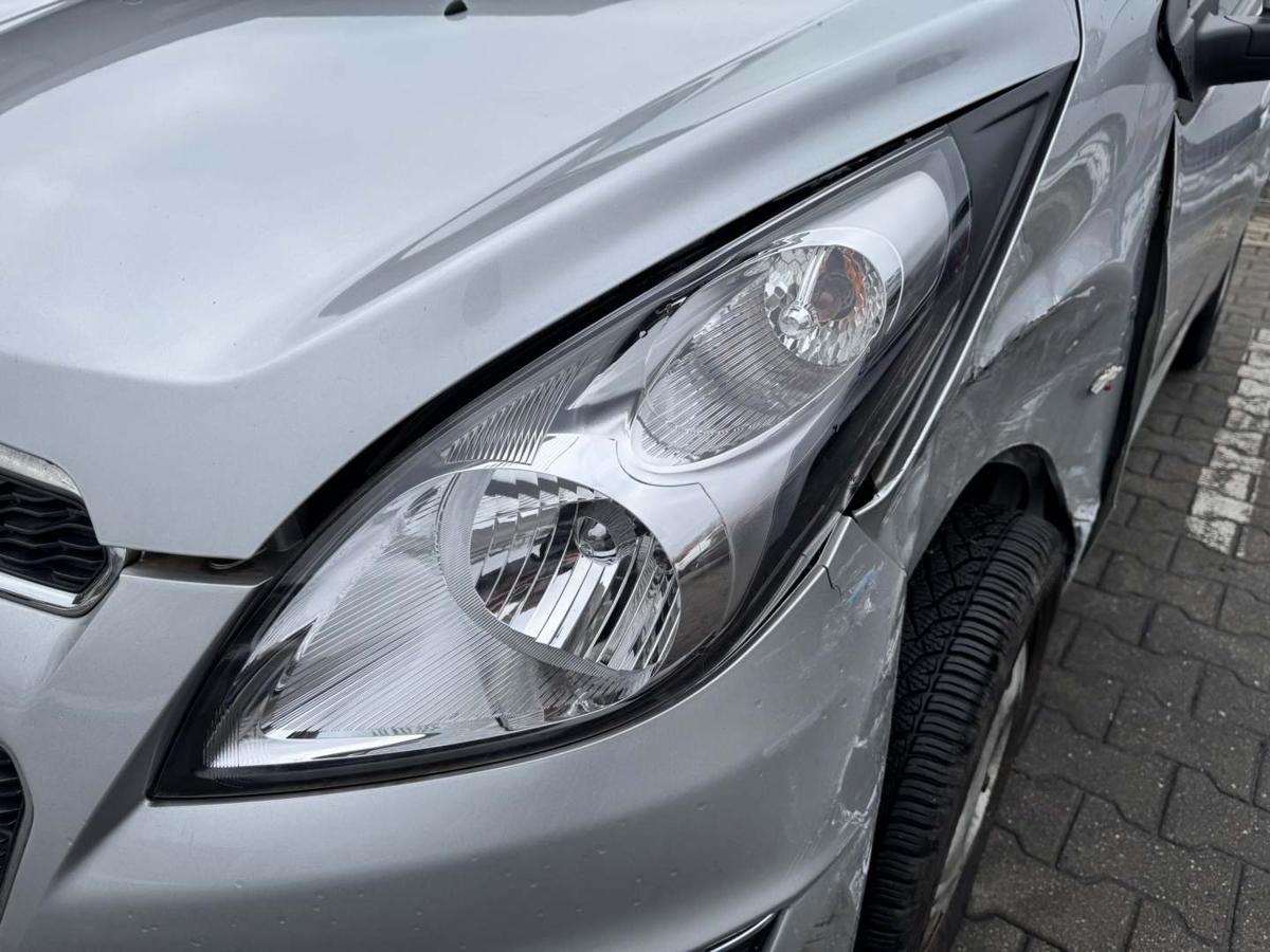 Chevrolet Spark original Scheinwerfer vorn links Halogen Facelift Bj.2013